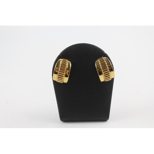 220 - Gold tone clip on earrings by designer Burberry