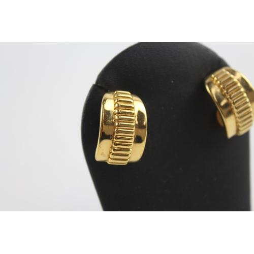 220 - Gold tone clip on earrings by designer Burberry