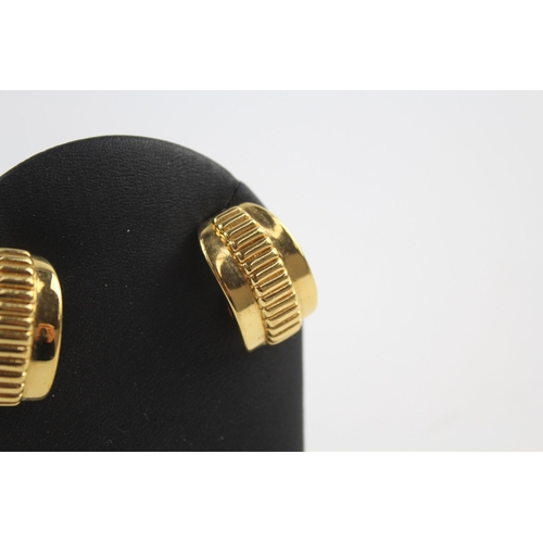 220 - Gold tone clip on earrings by designer Burberry