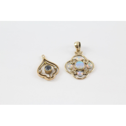 63 - 2 x 9ct gold antique floral openwork pendants set with white opal, sapphire & seed pearl (2.5g)