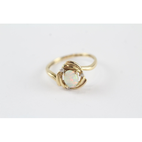 64 - 14ct gold synthetic white opal single stone ring with diamond accent (1.9g) Size  P