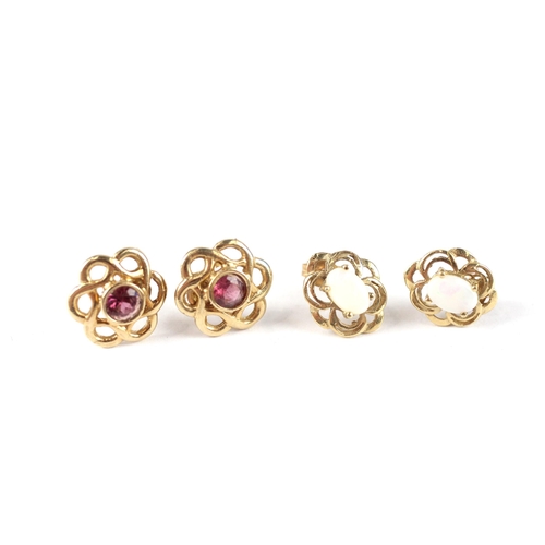 71 - 2 x 9ct gold garnet & white opal stud earrings (2.5g)