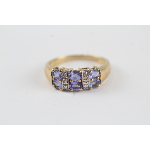 72 - 9ct gold diamond & tanzanite dress ring (2.7g) Size  P