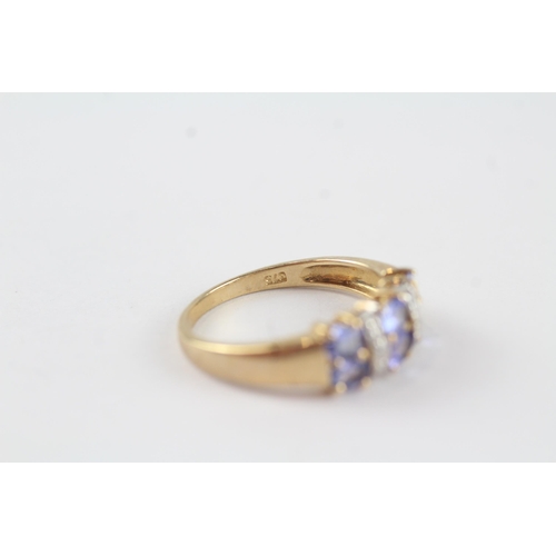 72 - 9ct gold diamond & tanzanite dress ring (2.7g) Size  P