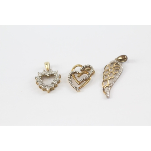 73 - 3 x 9ct gold diamond pendants inc. heart & wing (3.2g)