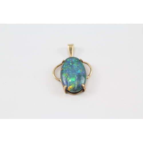 74 - 2 x 9ct gold black opal triplet pendants (2.7g)