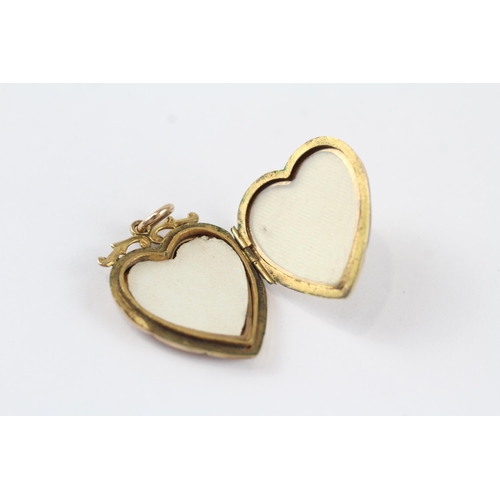 75 - 9ct gold back & front heart shaped locket with foliate motif (4.1g)