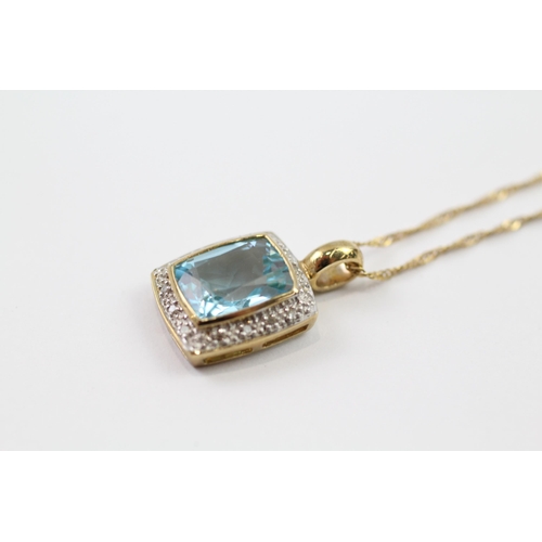 79 - 9ct gold diamond & blue topaz pendant necklace (3.5g)