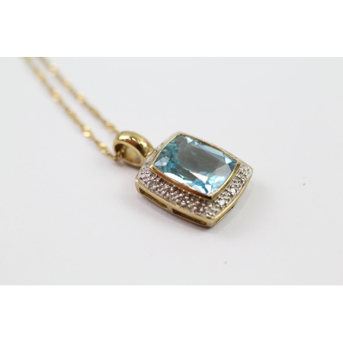 79 - 9ct gold diamond & blue topaz pendant necklace (3.5g)