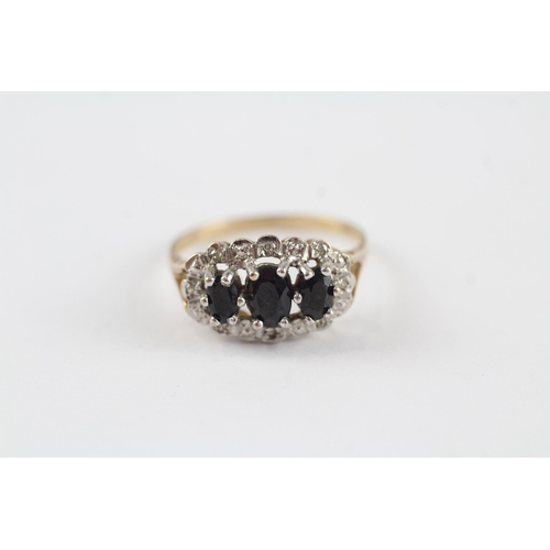 80 - 9ct gold sapphire three stone ring with diamond frame (2.4g) Size  P