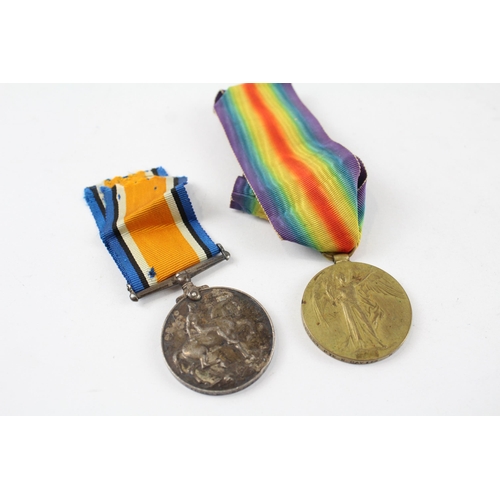 234 - WW.I Medal Pair. Named. 352821 Pte. W. Davies Royal Scots.