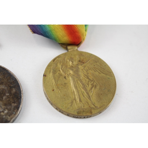 234 - WW.I Medal Pair. Named. 352821 Pte. W. Davies Royal Scots.