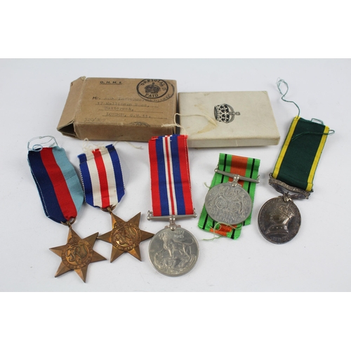 259 - WW2 Boxed Medal Group including France and Germany Star etc.  Territorial Medal named S. 69106 PTE A... 