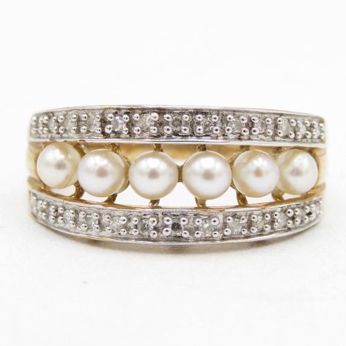 141 - 9ct gold diamond & cultured pearl eternity ring (3.1g) Size  P