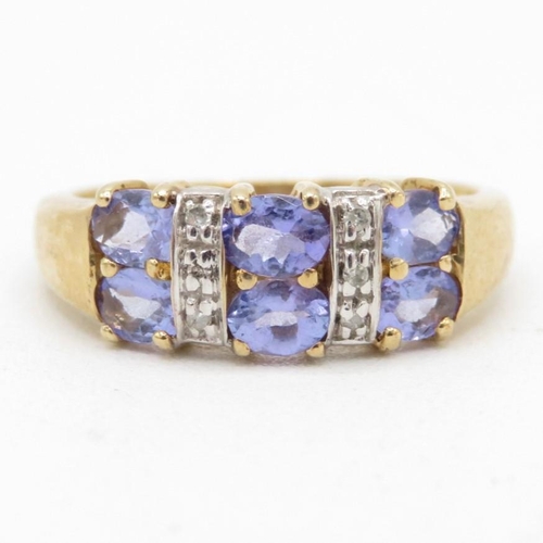 72 - 9ct gold diamond & tanzanite dress ring (2.7g) Size  P