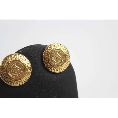 152 - Gold tone logo clip on earrings by designer Givenchy