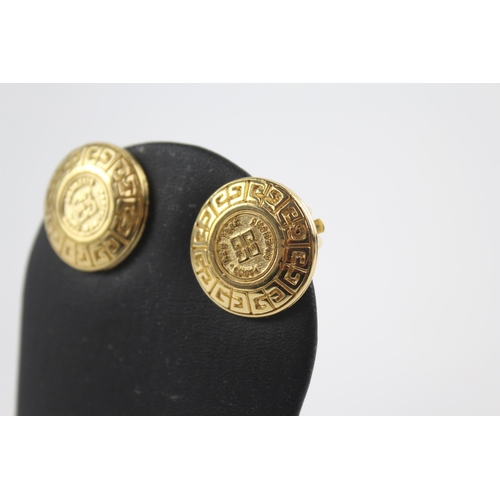 152 - Gold tone logo clip on earrings by designer Givenchy