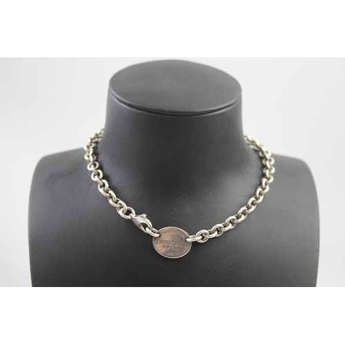 158 - Silver necklace with tag by designer Tiffany & Co