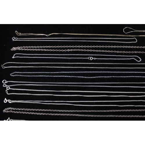 166 - A collection of silver chain necklaces including belcher