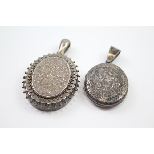 169 - Two silver antique lockets with etched designs