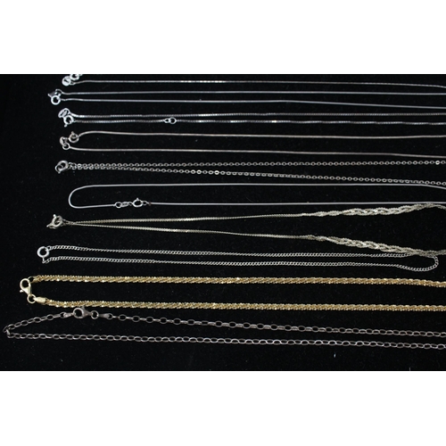 180 - A collection of silver chain necklaces including tinsel