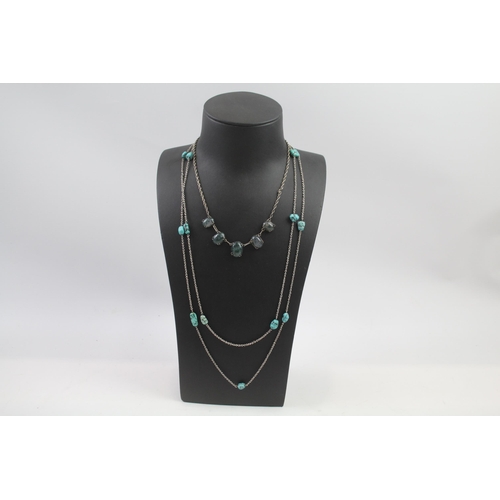 181 - Two silver gemstone necklaces including Turquoise and Moss Agate