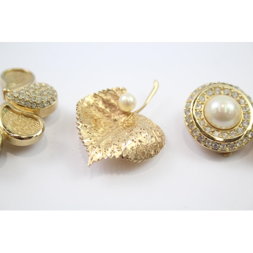 189 - A collection of gold tone jewellery by designer Grosse