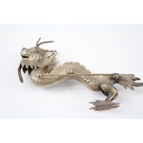 198 - A collection of Oriental jewellery including Dragon