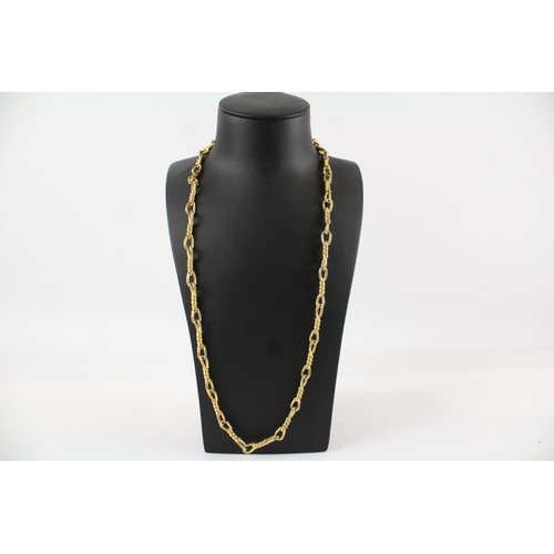 199 - Long length gold tone necklace by designer Christian Dior