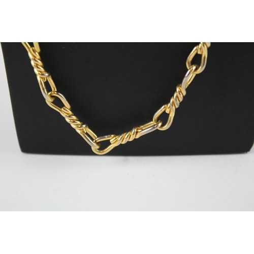 199 - Long length gold tone necklace by designer Christian Dior