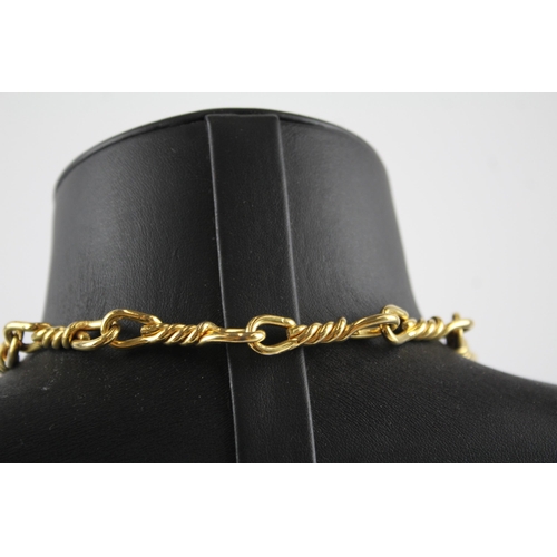 199 - Long length gold tone necklace by designer Christian Dior