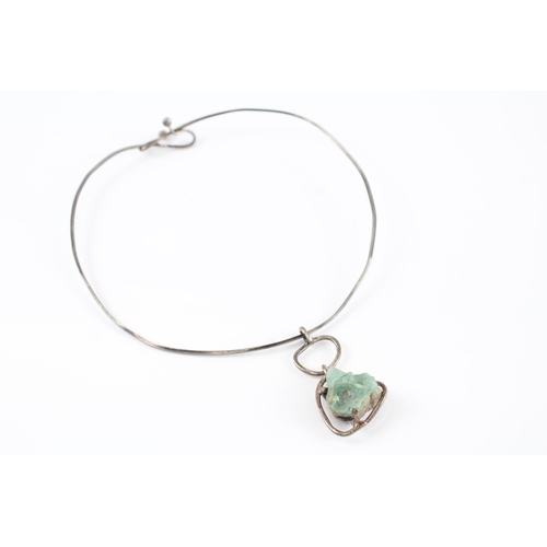 208 - Silver modernist torque necklace with druzy pendant