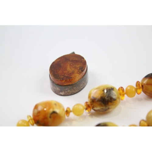 214 - A collection of silver Amber jewellery including Butterscotch