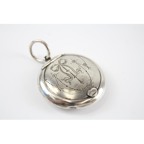 219 - Silver antique keepsake pendant with etched design