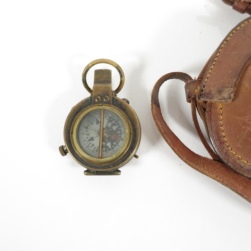 289 - Military compass with leather carrying pouch and straps