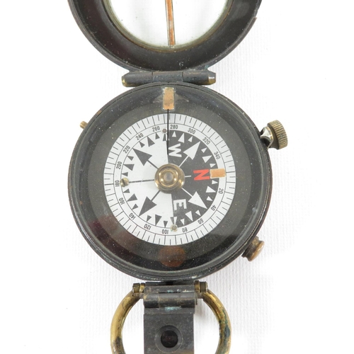 289 - Military compass with leather carrying pouch and straps