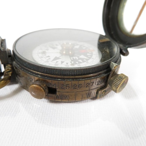 289 - Military compass with leather carrying pouch and straps