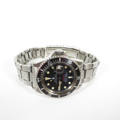 365 - 1973 ROLEX Single Red Submariner retailed by Garrard's in March 1973 with paperwork, inner and outer... 