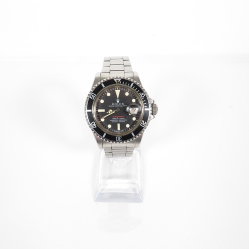 365 - 1973 ROLEX Single Red Submariner retailed by Garrard's in March 1973 with paperwork, inner and outer... 