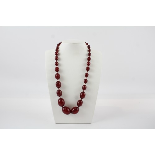 163 - Cherry Bakelite graduated necklace with internal streaking 70g