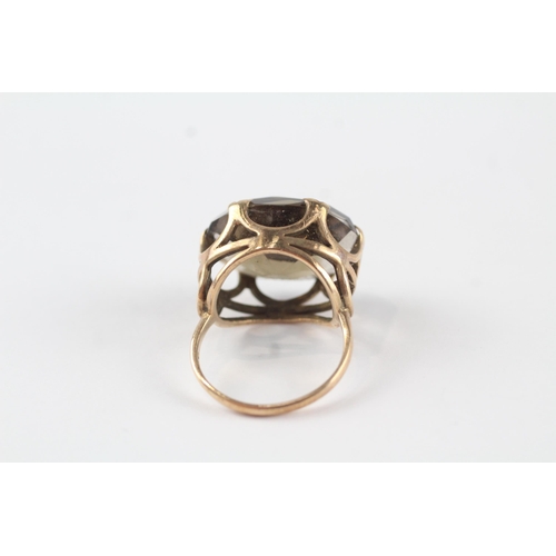 108 - 9ct gold smokey quartz dress ring (6.6g) Size  O 1/2