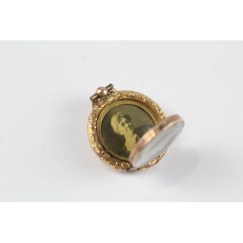 116 - 9ct gold antique locket (6g)