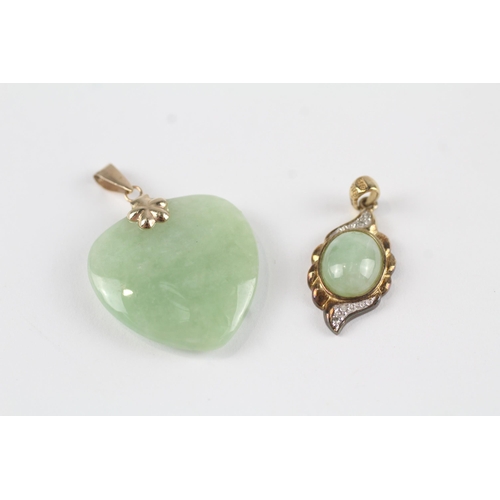 123 - 2x 9ct gold jade & diamond pendants (7.3g)