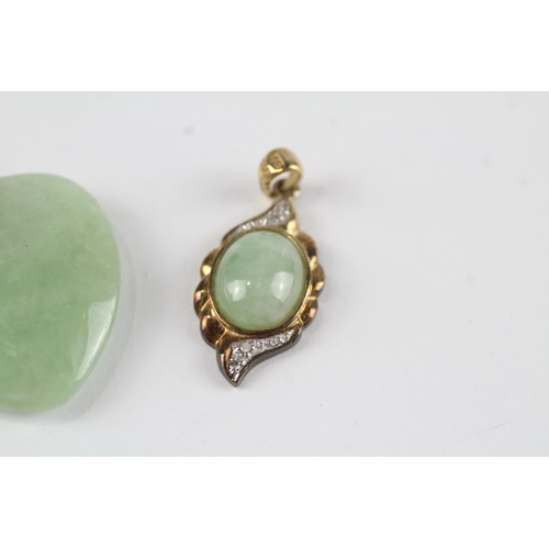 123 - 2x 9ct gold jade & diamond pendants (7.3g)