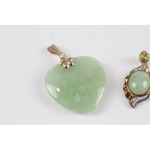 123 - 2x 9ct gold jade & diamond pendants (7.3g)