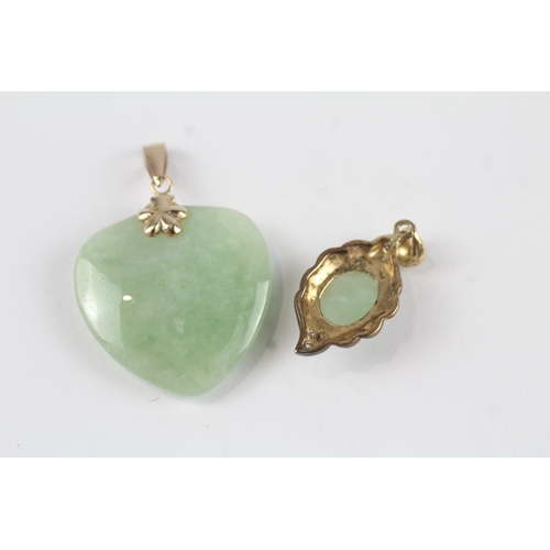 123 - 2x 9ct gold jade & diamond pendants (7.3g)