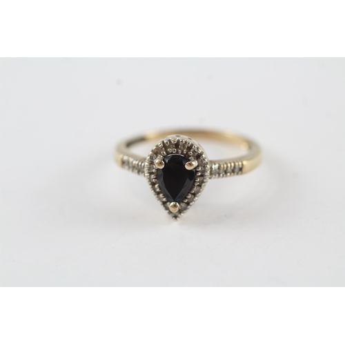 127 - 9ct gold black gem & diamond halo ring (2.1g) Size  P