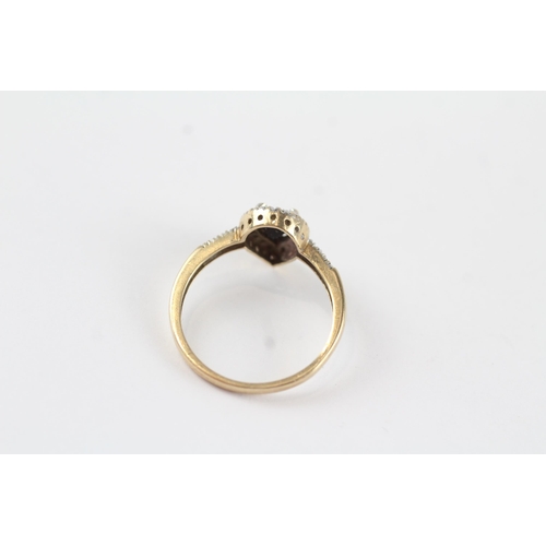 127 - 9ct gold black gem & diamond halo ring (2.1g) Size  P