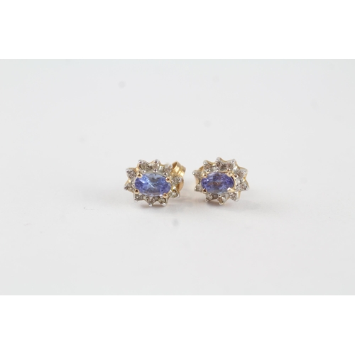 129 - 9ct gold tanzanite & diamond cluster stud earrings (1.1g)