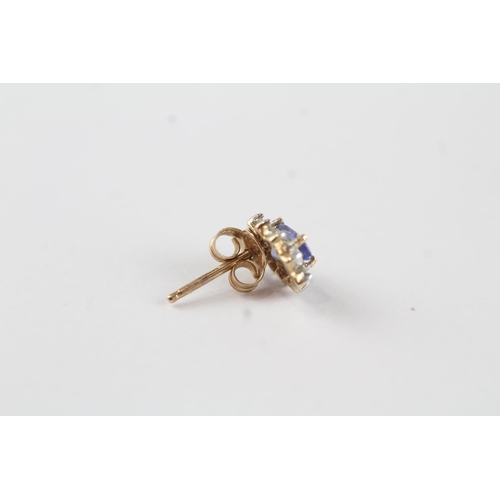 129 - 9ct gold tanzanite & diamond cluster stud earrings (1.1g)